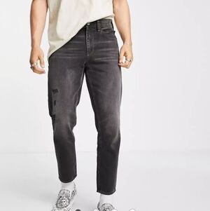 ASOS DESIGN classic rigid jeans in washed black with abrasions w 30" L 32"